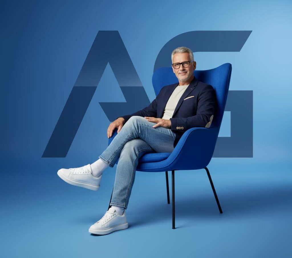 Portrait élégant et cinématographique d’un homme dans un fauteuil moderne via Nano-Banana